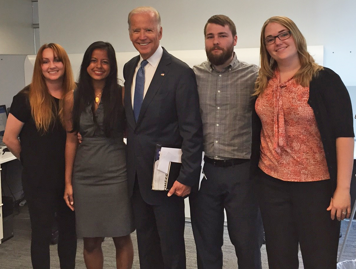 APPC postdoctoral fellows Ariel Hassell, Meghnaa Tallapragada, Ben Lyons, and Brienne Suldovsky (left to right) with Vice President Biden (center).