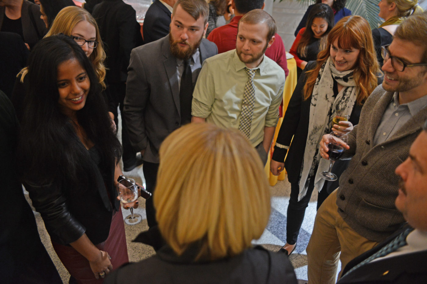 Speaking with Marcia McNutt are APPC postdocs (l-to-r) Meghnaa Tallapragada, Brianne Suldovsky, Ben Lyons, Robert Lull, Ariel Hasell and Joe Hilgard, and Visiting Scholar William K. Hallman.