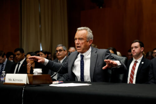 Robert F. Kennedy testifying before a Senate Committee