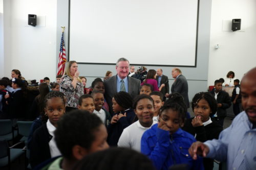 Jim Kenney poses for a photo with students.