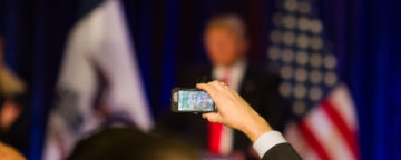 Trump being recorded as he speaks to a crowd. Credit: Max Goldberg/Iowa State Daily.