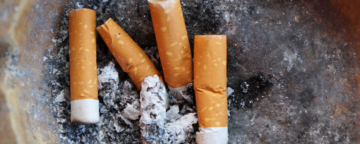 Cigarette butts in an ashtray.