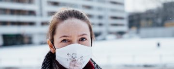 A woman wearing a protective face mask (author: Freestocks.org; location: Warsaw, PL)