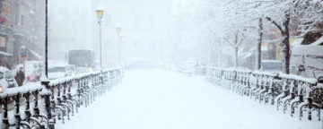 Snowy street scene. Credit: Filip Bunkens/Unsplash. For story on holiday-suicide myth.