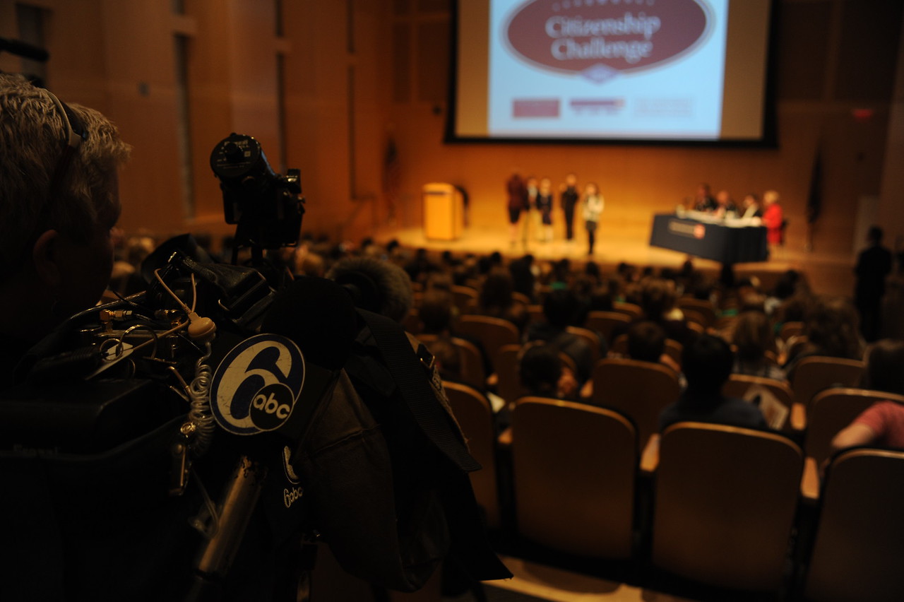 Camera crew from 6 ABC News films one of the presentations.