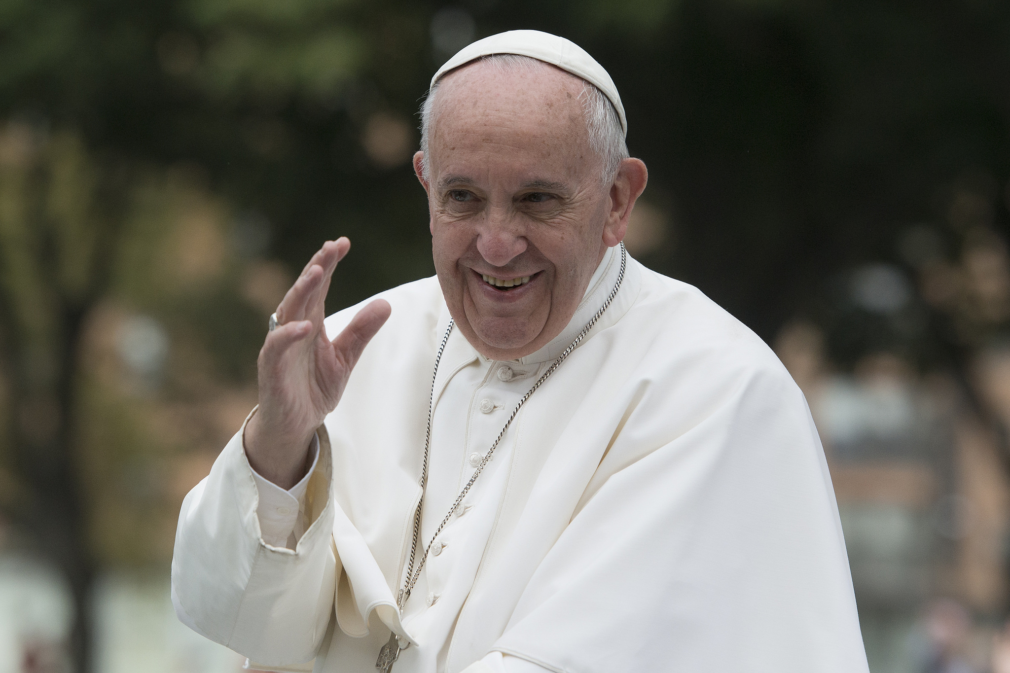 Pope Francis waves to crowds in Philadelphia during his September 2015 visit. Credit: Jeffrey Bruno.