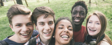 Group of teens taking a selfie. Credit: Flickr user verkeorg.