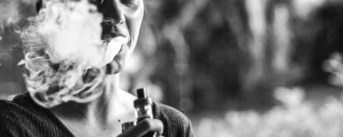 Woman smoking an e-cigarette. Credit: Finn Gross Maurer, via Unsplash. Misleading pro-tobacco videos on YouTube can sway young adults attitudes toward those products.